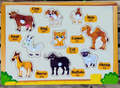 Wooden pet and farm animals puzzle board with knobs