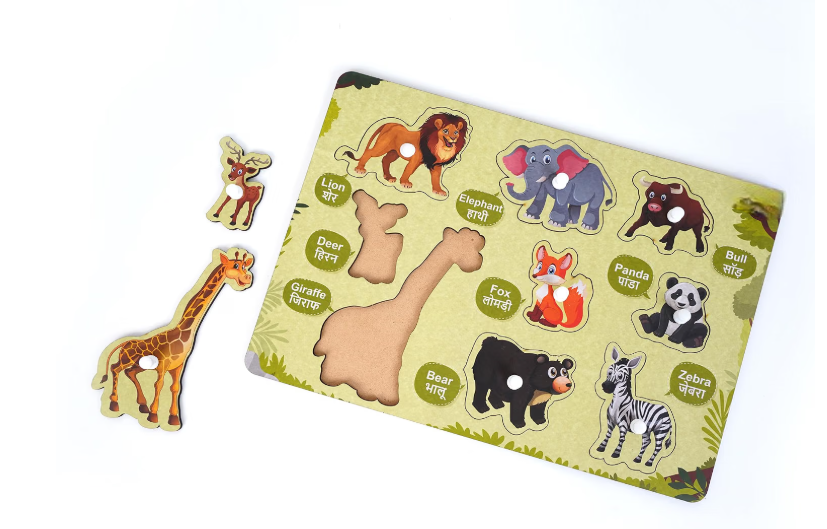 Wild animals puzzle with giraffe and deer pieces lifted out